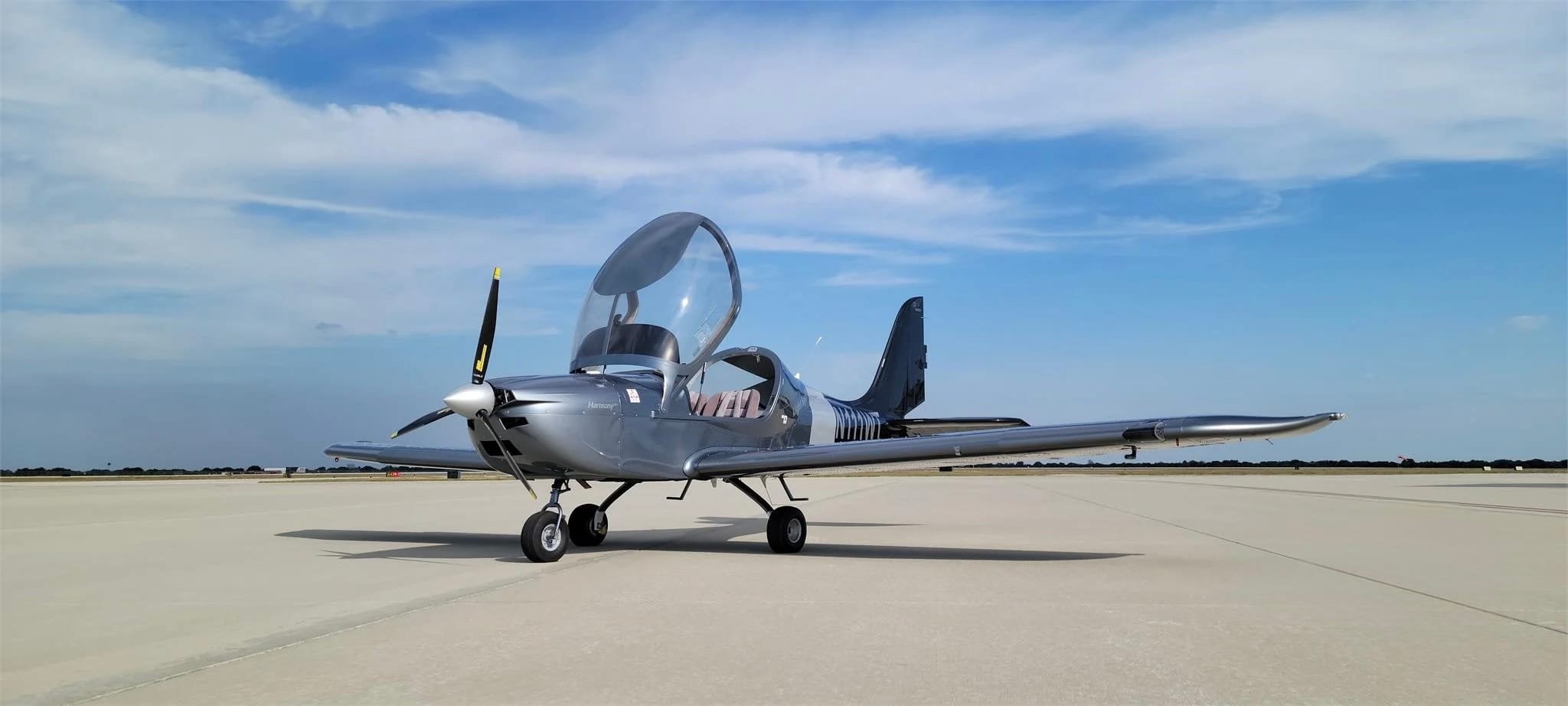 2024 Evektor Harmony LSA N111WT – front left quarter, canopy open, ramp