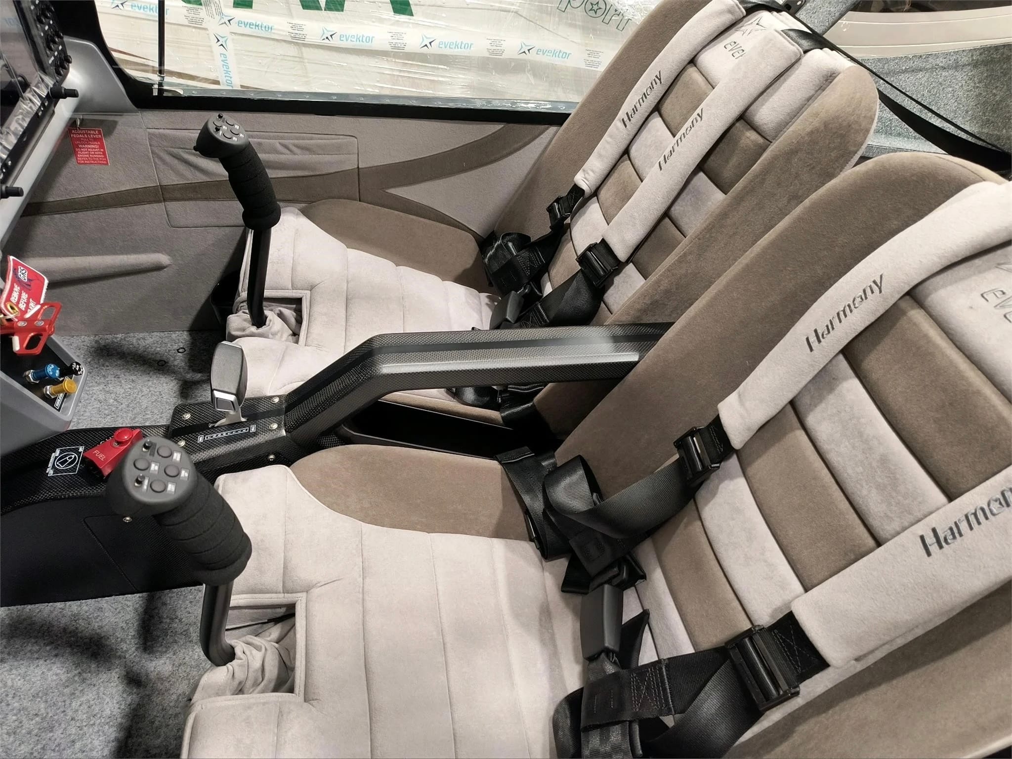 2024 Evektor Harmony LSA N111WT – interior, dual tan seats, carbon fiber armrest