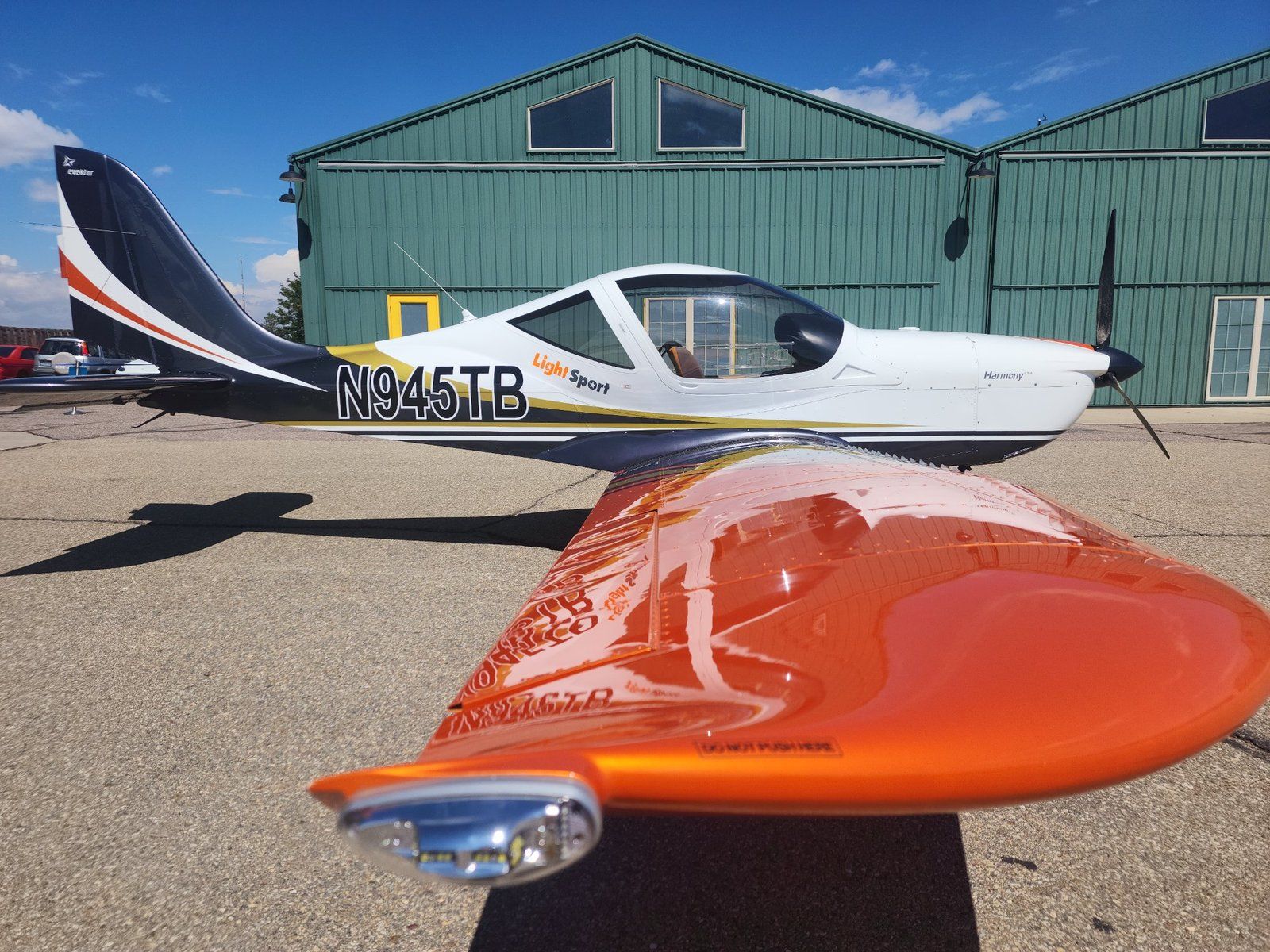 2024 Evektor Harmony LSA N945TB – orange wingtip low angle