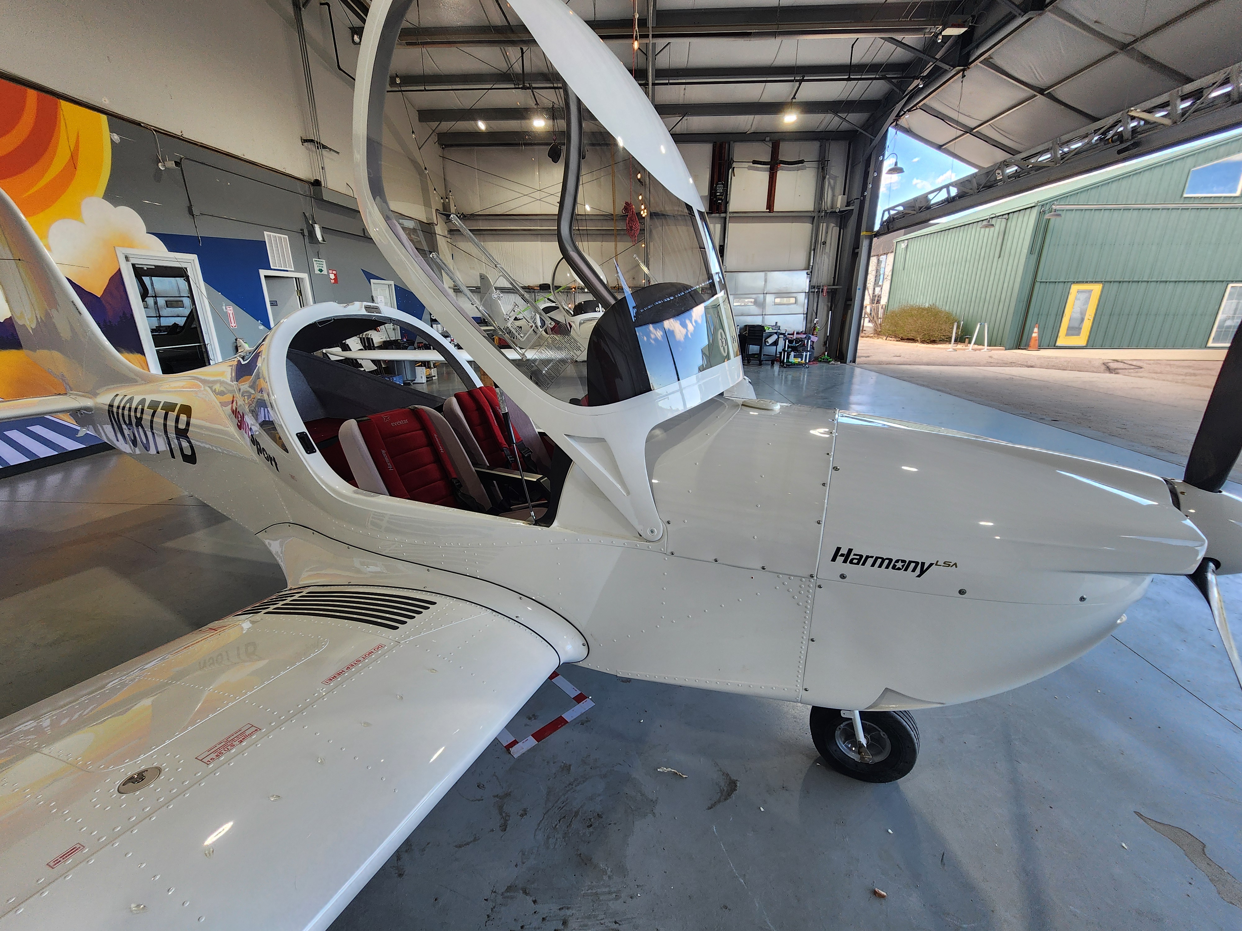 2025 Evektor Harmony LSA N987TB – pilot-side cockpit, Garmin G3X, red interior
