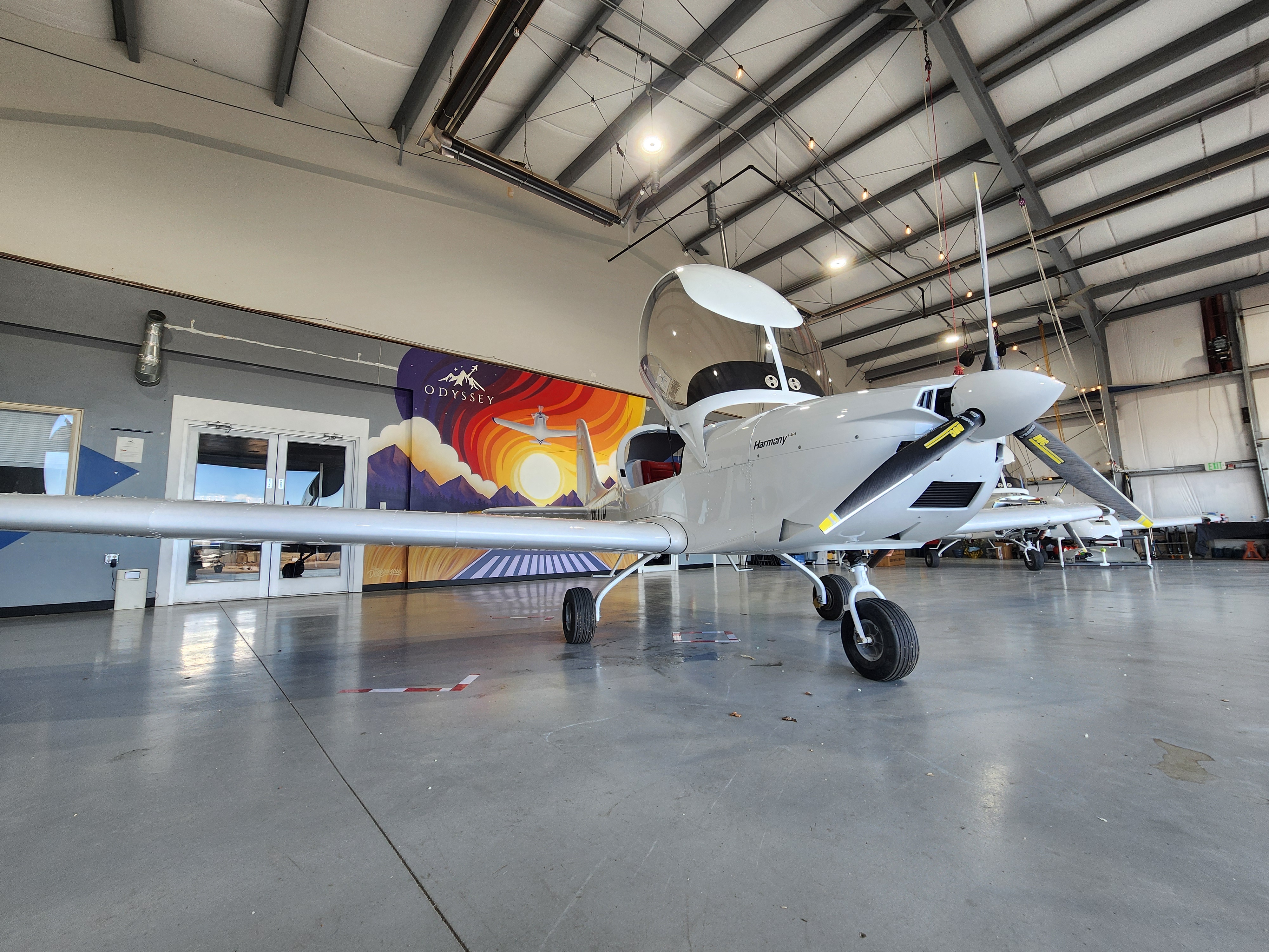 2025 Evektor Harmony LSA N987TB – front left profile, canopy closed, Odyssey mural